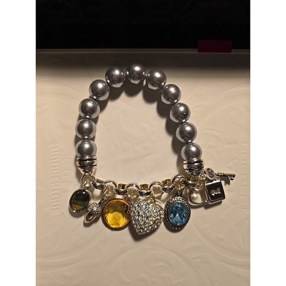 Avon Jewelry - Vintage AVON Stretch Bracelet Beaded Silver Tone Heart Locket Charm 2008 NIB